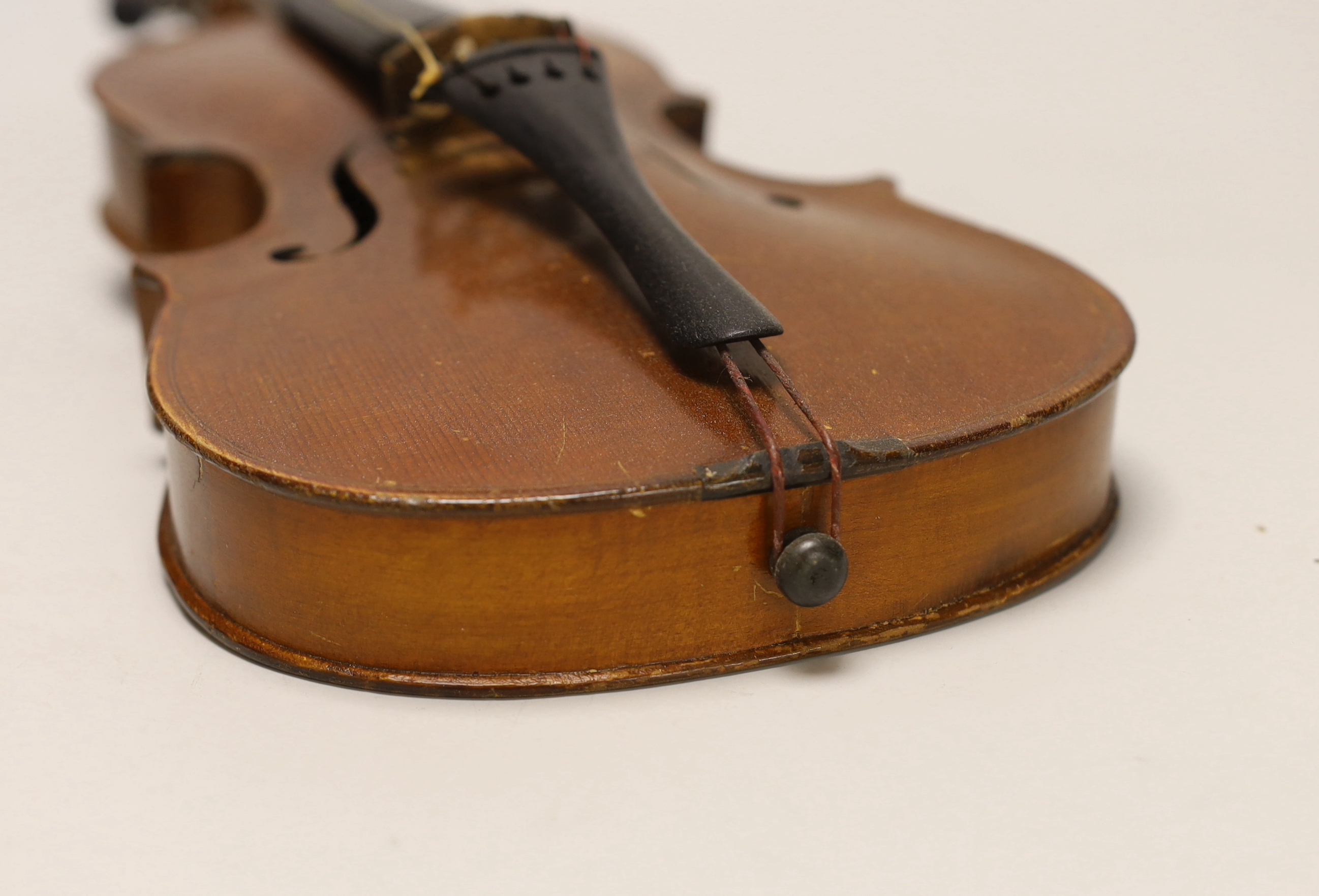 A three quarter size German violin, in case violin 56cm long